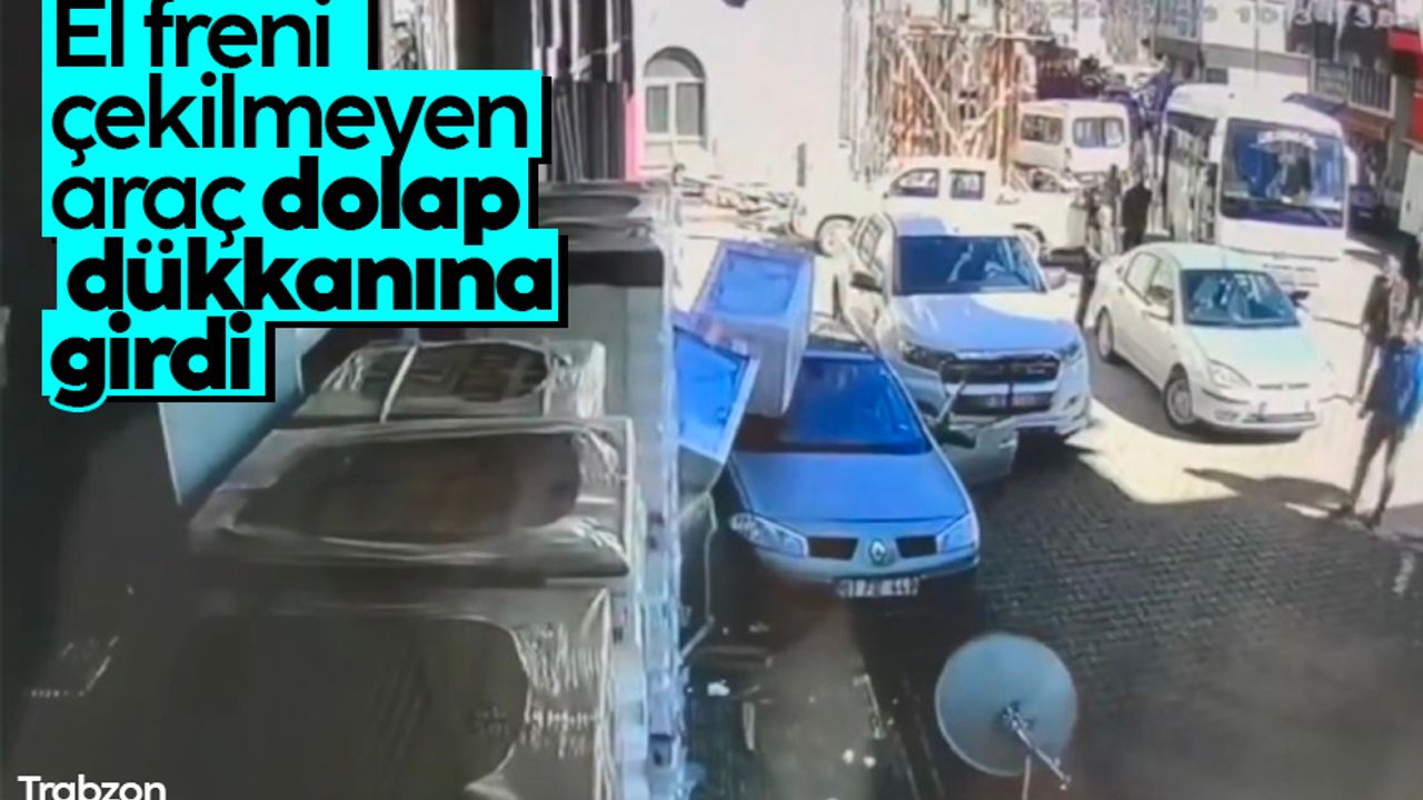 Trabzon'da el freni çekilmeyen araç, buzdolabı dükkanına girdi