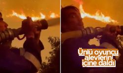 Oyuncu İbrahim Çelikkol, alevlerin içine hortumla daldı