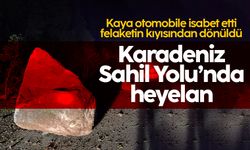 Karadeniz Sahil Yolu'nda heyelan; kaya isabet otomobil hasar gördü